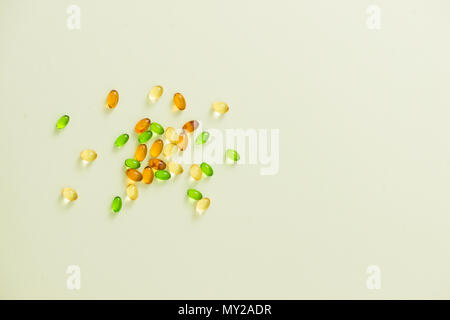 Nutrition And Vitamin Filling In Colorful Soft Gelatin Capsule Stock Photo