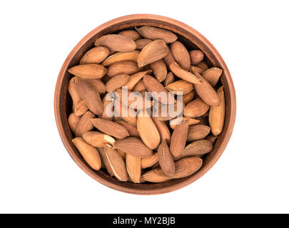 Bowl full uzbek of almonds without the shell on white background, top view Stock Photo