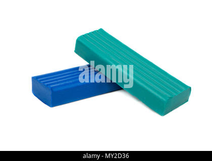 Pieces of green and blue plasticine isolated on white background Stock Photo