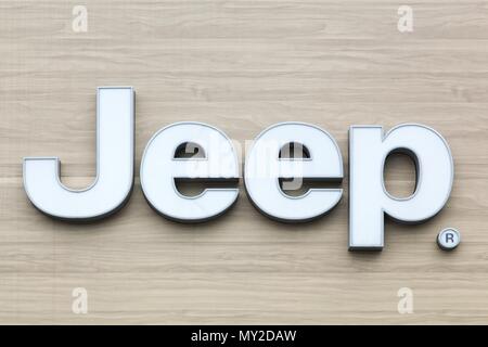 Macon, France - May 27, 2018: Jeep logo on a wall. Jeep is a brand of American automobiles and a wholly owned subsidiary of Fiat Chrysler Automobiles Stock Photo