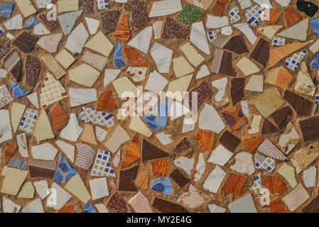 Colorful stone mosaic with chaotic pattern, background photo texture Stock Photo