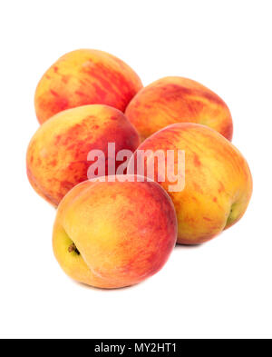 Several ripe peaches on a white background Stock Photo