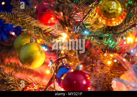 Decorated Christmas tree on blurred,  Beautiful Christmas ball hanging decorated christmas tree background. Stock Photo