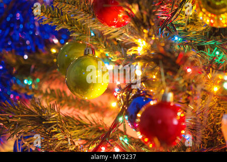 Decorated Christmas tree on blurred,  Beautiful Christmas ball hanging decorated christmas tree background. Stock Photo