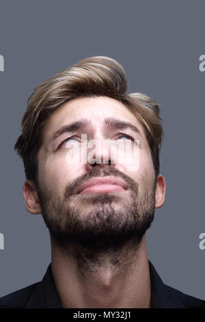 Portrait of a man with closed eyes, his head thrown back Stock Photo