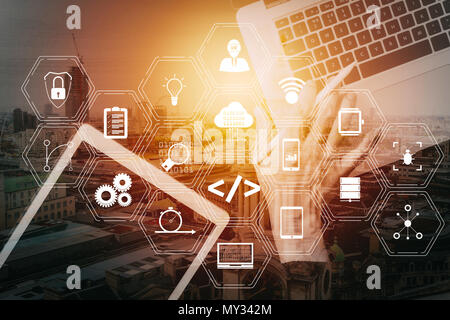 Coding software developer work with augmented reality dashboard computer icons of scrum agile development and code fork and versioning with responsive Stock Photo