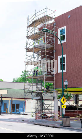 Gatlinburg,TN, USA – May 14, 2018: Workers renovating the Ripley's Believe it or Not building on the Gatlinburg strip. Focus is on the building. Stock Photo