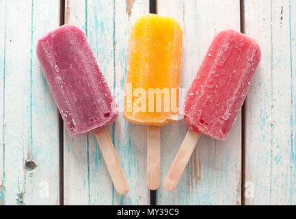 Assorted flavored ice popsicles Stock Photo