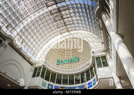 Shopping: Bentalls sign in the interior of the popular modern Bentall Centre shopping mall in Kingston upon Thames town centre, Greater London, UK Stock Photo