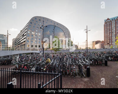 ROTTERDAM, NETHERLANDS - MAY 31, 2018: Exterior view of the Market Hall a residential and office building. Bicycle parking in Rotterdam.