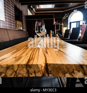 ROSTOV-ON-DON, RUSSIA - 24 FEBRUARY 2018: Glasses on slab table in restaurant Stock Photo
