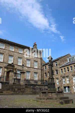 Judges' Lodgings and Covell Cross in Lancaster, England. A museum of childhood and Gillow furniture collection are in the Judges' Lodgings town house. Stock Photo
