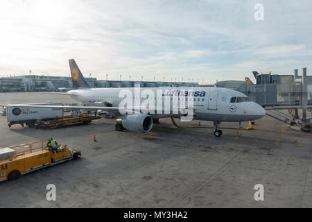 A Lufthansa Airbus A320-200 on the stand in Munich Airport, (Flughafen München), Germany. Stock Photo