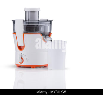 electric juicer with cup on white background with reflection. kitchen appliances Stock Photo