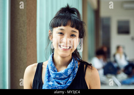 Female college student smiling cheerfully, portrait Stock Photo - Alamy