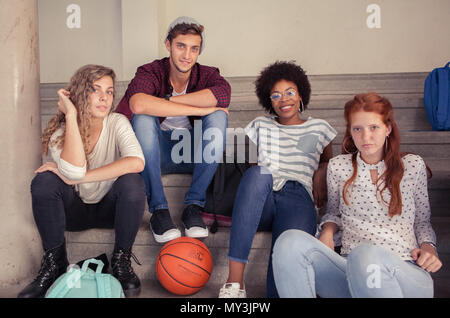 Group of friends hanging out together after school, portrait Stock Photo