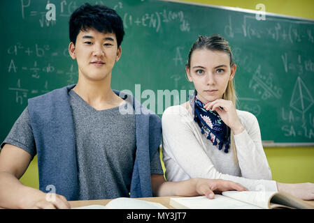 Students sitting in math class, portrait Stock Photo