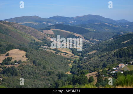 View Of The Village Of Rebedul From The Top Of The Meadows Of The Mountains Of Galicia. Travel Flowers Nature. August 18, 2016. Rebedul, Becerrea Lugo Stock Photo