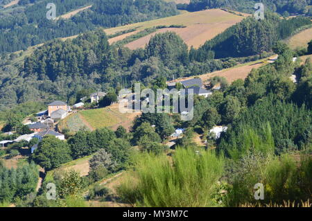 View Of The Village Of Rebedul From The Top Of The Meadows Of The Mountains Of Galicia. Travel Flowers Nature. August 18, 2016. Rebedul, Becerrea Lugo Stock Photo