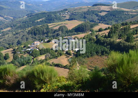 View Of The Village Of Rebedul From The Top Of The Meadows Of The Mountains Of Galicia. Travel Flowers Nature. August 18, 2016. Rebedul, Becerrea Lugo Stock Photo