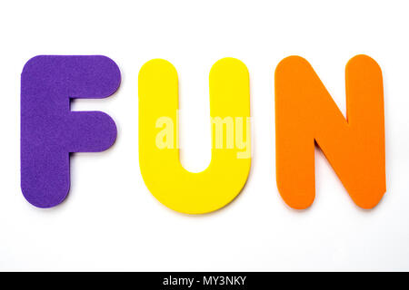 the word funny spelt out with colourful fridge magnets Stock Photo - Alamy