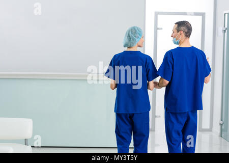 two surgeons discussing diagnosis in hospital Stock Photo