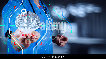 Accurate diagnosis appropriate treatment medical concept.medical  doctor with brain3d meatl in his hands as concept Stock Photo