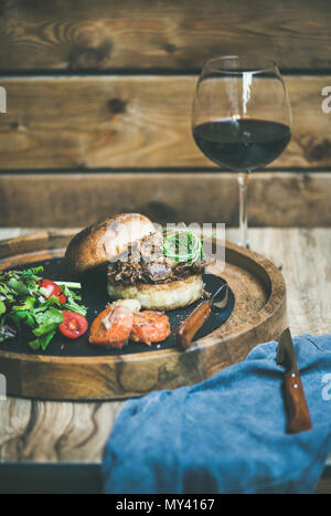 homemade pulled pork burger with coleslaw and bbq sauce Stock Photo