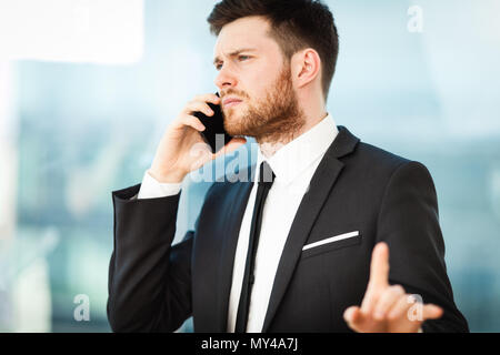 Young businessman in office Stock Photo
