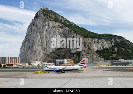 British Airways Airbus aircraft being pushed back for departure at Gibraltar International Airport Stock Photo
