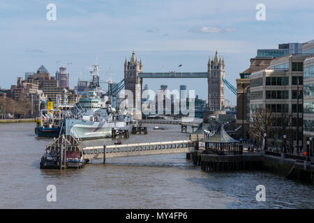 A landscape view of tower bridge and hms belfast on the river thames in central london, uk. Stock Photo