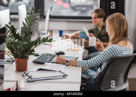 young colleagues working at modern office
