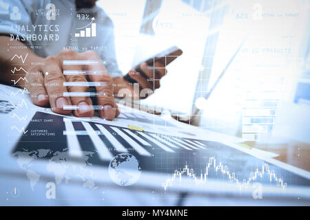 Intelligence (BI) and business analytics (BA) with key performance indicators (KPI) dashboard concept.business documents on office table with smart ph Stock Photo