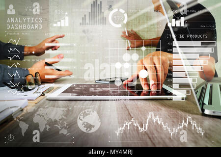 Intelligence (BI) and business analytics (BA) with key performance indicators (KPI) dashboard concept.Businessman making presentation with his colleag Stock Photo