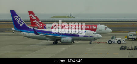 Nagoya, Japan - Mar 19, 2018. Passenger airplanes docking at Chubu Centrair Airport (NGO) in Nagoya, Japan. Stock Photo