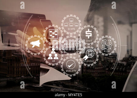 Project management diagram of cost, time, scope, human resources, risks, quality and communication with icons.Double exposure of Designer hand using m Stock Photo