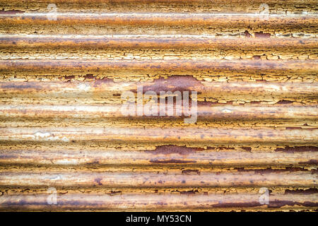 Old weathered rustic fold able garage gate close up Stock Photo
