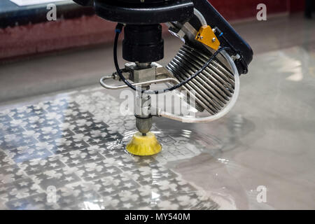 Precision 5 axis cutting head with direct drive technology Stock Photo