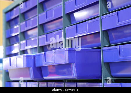 Plastic drawer for keeping parts in factory Stock Photo