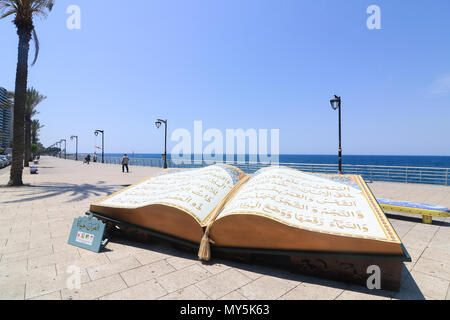 Beirut Lebanon. 6th June 2018. A large opened Qoran book on the Beirut corniche seafront  to celebrate the Islamic holy month of Ramadan which ends on 15th June. Ramadan traditionally falls on the ninth month of the Islamic calendar, and is observed by Muslims worldwide as a month of fasting (Sawm) to commemorate the first revelation of the Quran to the prophet Muhammad Credit: amer ghazzal/Alamy Live News Stock Photo