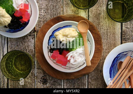 Iced Durian or Es Campur Duren. Cold, icy dessert of crushed ice with durian, jellies, agar agar, and coconut. Stock Photo