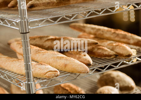 shelves with freshly baked bread on baking manufacture