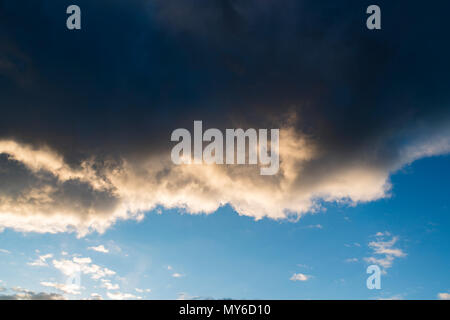 Black storm clouds, The atmosphere is gloomy forming a rainstorm. Bad weather at the start of the monsoon season. Big black gloomy rain cloud in the s Stock Photo