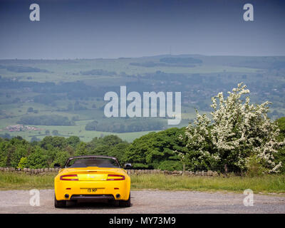 2008 Aston Martin Vantage Convertible at the Cow & Calf rocks Ilkley Moor North Yorkshire UK Stock Photo