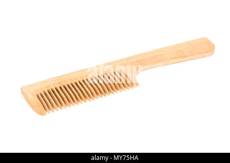 Wooden comb isolated on white background close-up Stock Photo