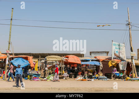 Addis Ababa, Ethiopia, January 30, 2014, Busy street with a row of informal traders selling their goods Stock Photo