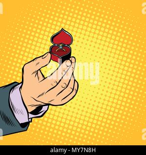 male hand with ring box, engagement Stock Vector