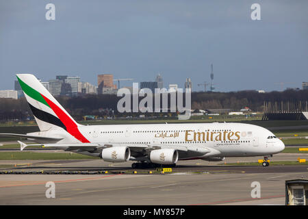 Emirates Airbus A 380-800, aircraft, at Amsterdam Schiphol Airport, in North Holland, Netherlands, Stock Photo