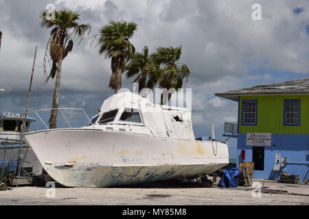 Hurricane Matthew 2016 damage.  West End settlement Grand Bahama Island, Bahamas. Boat stranded on land. Stock Photo