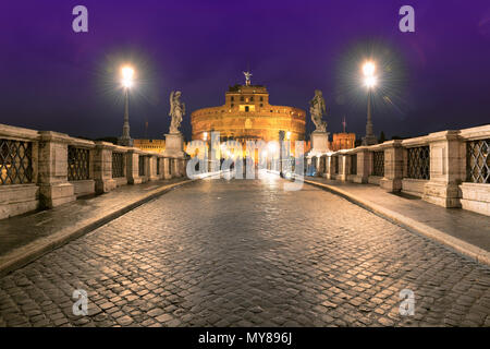 Saint Angel Castle and bridge at night in Rome, Italy. Stock Photo